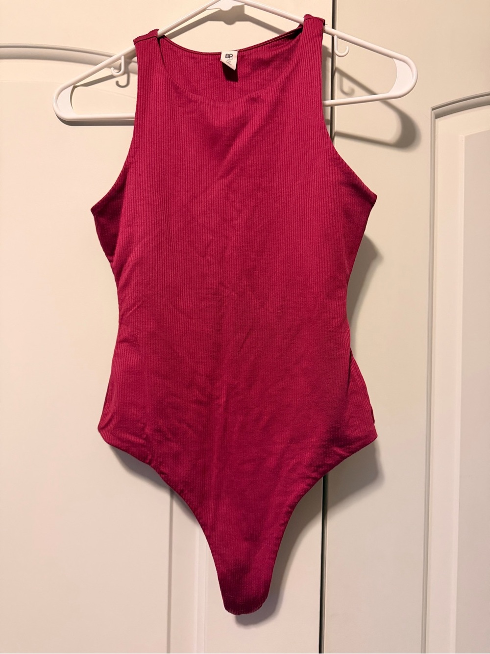 BP Women’s Ribbed Sleeveless One-Piece Bodysuit in Fuchsia XS